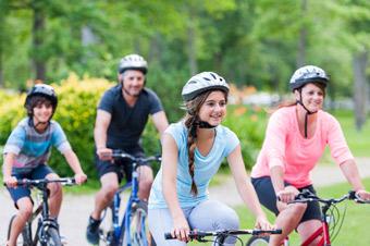 teens and parents riding bikes